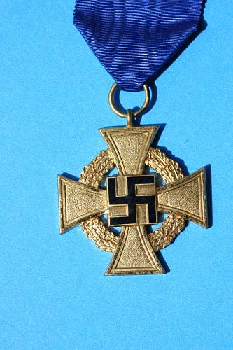 A 40 year service cross - fake?