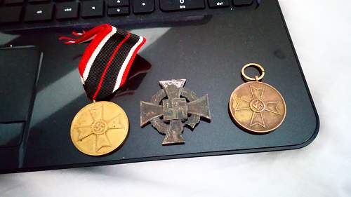 Real or Fake? 2 War Merit Medals and damaged Civil Service Faithful Service Medal