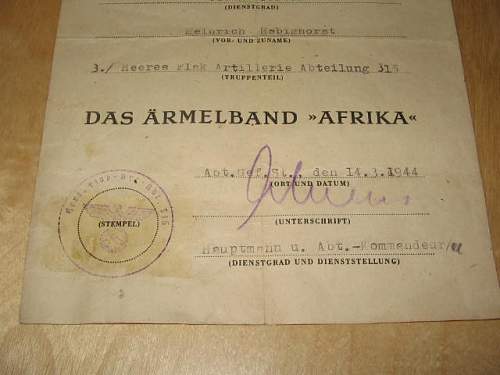 Ärmelband Afrika &amp; award citation