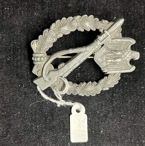 Can someone authenticate these denazified WWII German medals?