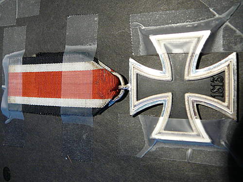 Identification on WWII veteren bring backs- German cross medal, sweat shirt Nazi logo, hat pin