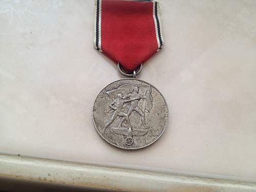 Could anyone help with my Anschluss medal?