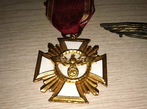 Ritterkreuz des Kriegsverdienstkreuzes mit Schwertern, Spanienkreuz, Infanterie-Sturmabzeichen, Dienstauszeichnung der NSDAP 25 Jahre.