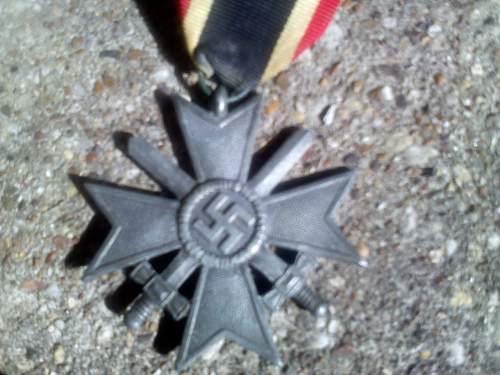 German Merit medal and WWI iron crosses