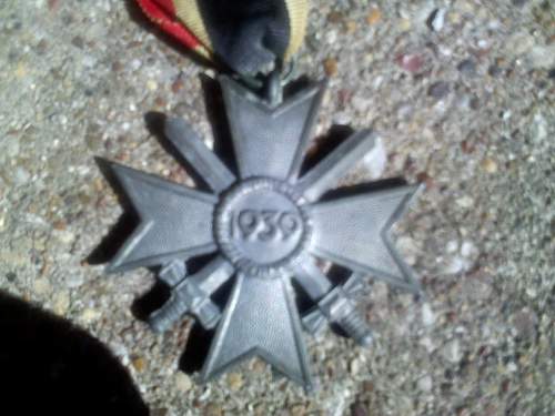 German Merit medal and WWI iron crosses