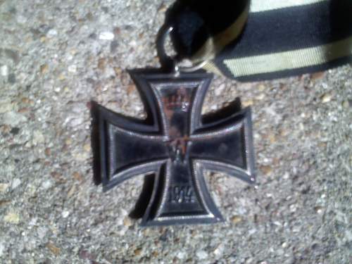 German Merit medal and WWI iron crosses