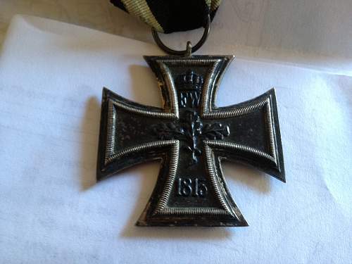 German Merit medal and WWI iron crosses