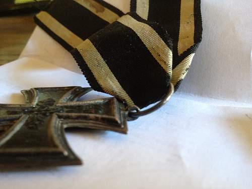 German Merit medal and WWI iron crosses