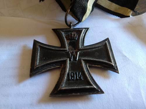 German Merit medal and WWI iron crosses