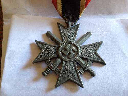 German Merit medal and WWI iron crosses