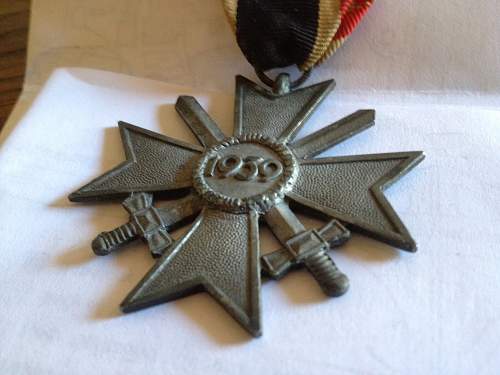 German Merit medal and WWI iron crosses