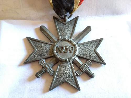 German Merit medal and WWI iron crosses