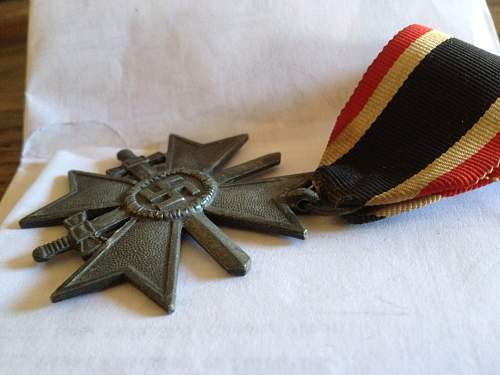 German Merit medal and WWI iron crosses