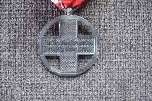 Help on NSDAP 7 Place Medal Bar and Red Cross medal