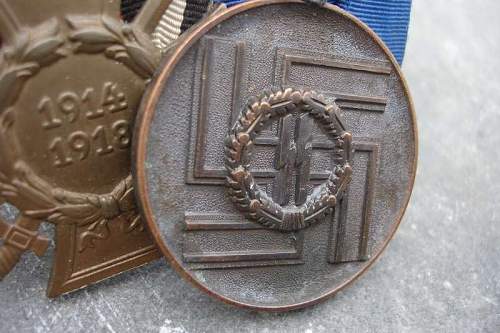 SS 8 year service medal in 4 medal bar.