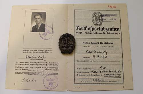 Unmarked DRL Sportabzeichen in Bronze with issue document from 1942.