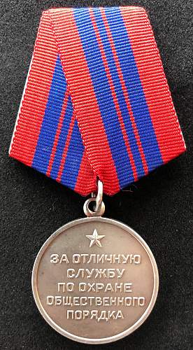 For Distinction in the Protection of Public Order set