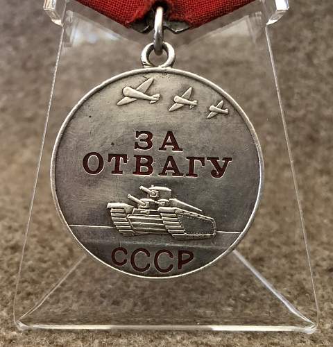 Medal &quot;For Courage&quot; with red ribbon and rare suspension