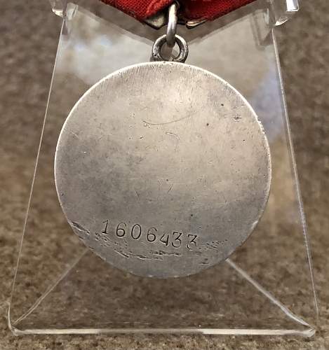 Medal &quot;For Courage&quot; with red ribbon and rare suspension
