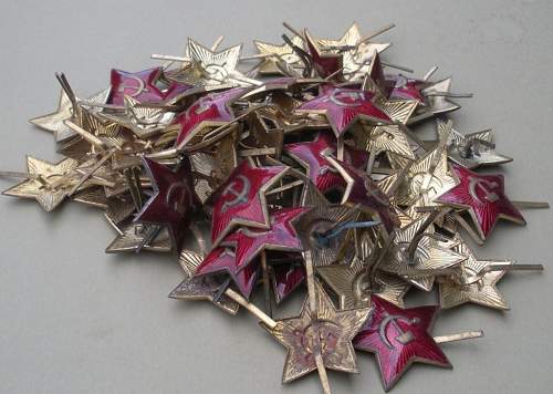 BIG Pile of M35 Cap Stars- Are ANY WWII Stars???