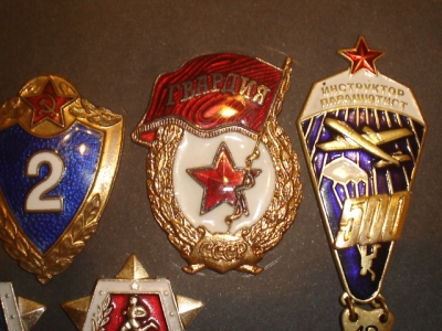 1951-1957 Russian era military badge and AK47 oiler questions