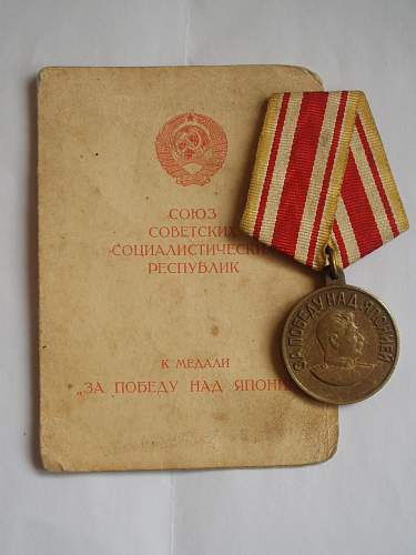 Victory Over Japan medal w/ Booklet. Authentic?