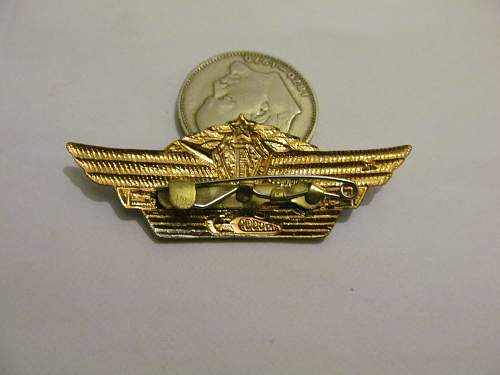 Help identifying Soviet badges and possible values.