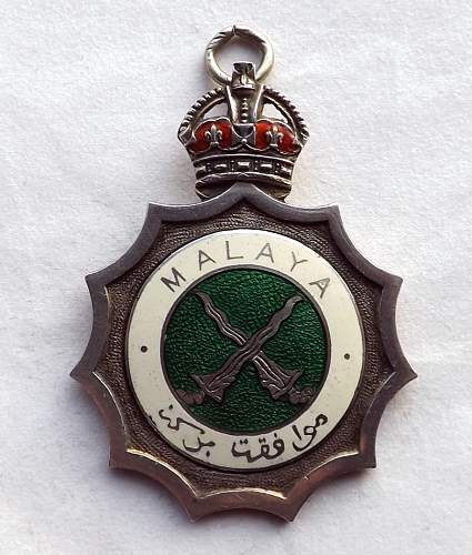 Mystery 'malaya' emergency medallion/award