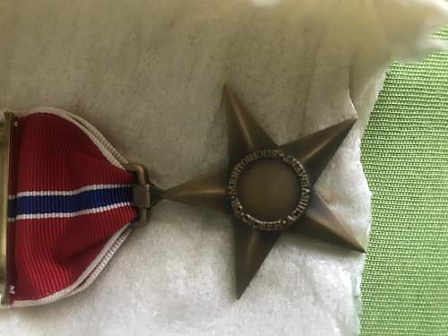 The bronze star in original Box