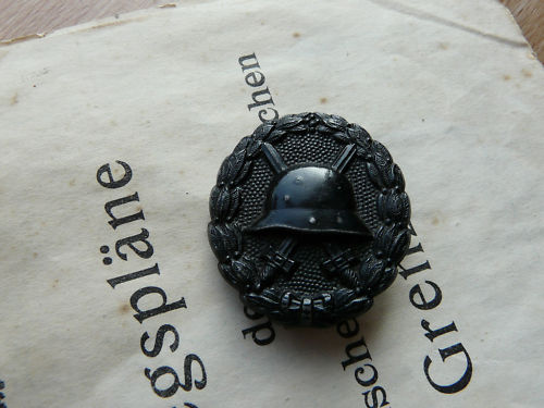 Views on this wounded badge ? Real of replica ?