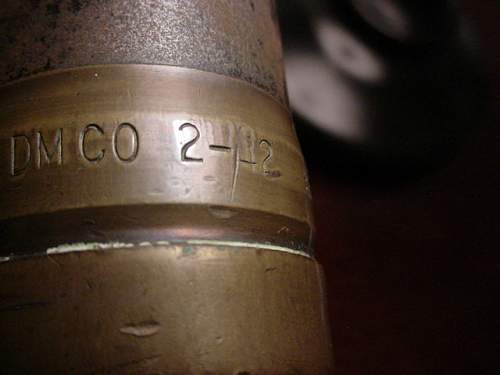 Two large ww2 shell casings and projectile