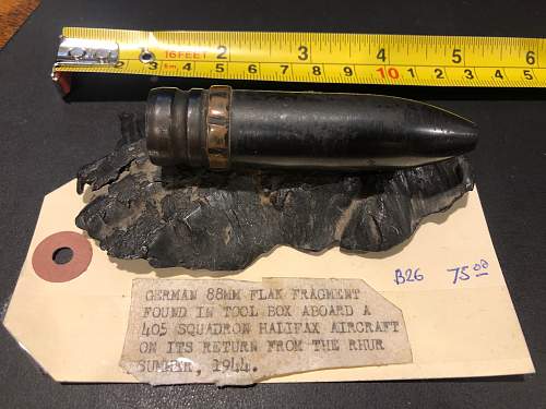 Mystery 20mm Shell mounted on WW2 German 88 Flak fragment.