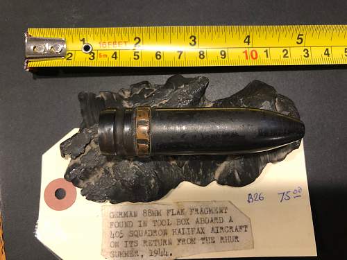Mystery 20mm Shell mounted on WW2 German 88 Flak fragment.