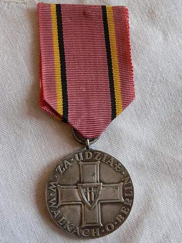 Can anyone help me identify these medals?