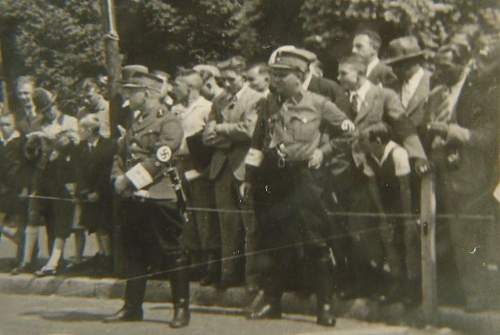 Original photos showing daggers/swords in wear.