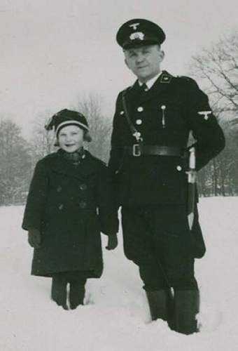 Original photos showing daggers/swords in wear.