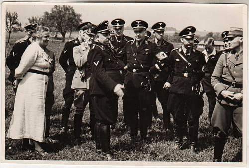 Original photos showing daggers/swords in wear.