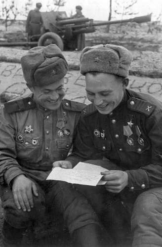 Any photos of a Soviet soldier wearing a medal during combat?