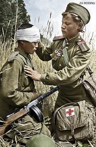 Any photos of a Soviet soldier wearing a medal during combat?