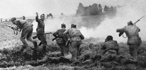 Any photos of a Soviet soldier wearing a medal during combat?