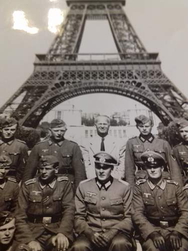 Who is this guy in white? Strange photo - eiffel tower 1941.