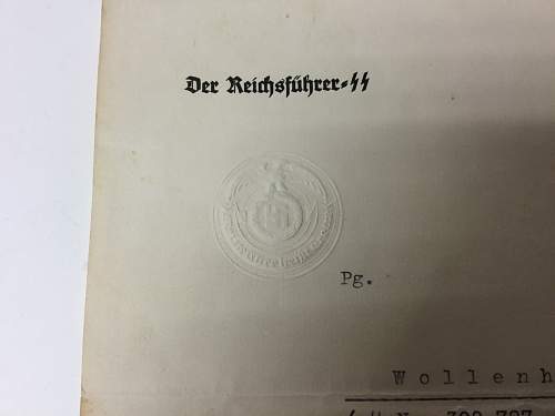 Himmler signed promotion documents.