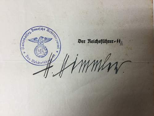 Himmler signed promotion documents.