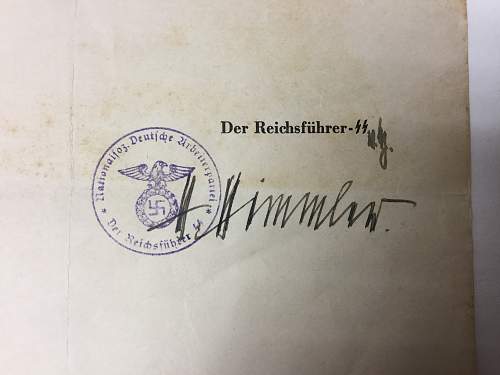 Himmler signed promotion documents.