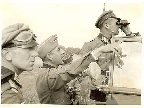 Looking for the right path. Photos of German soldiers with maps.... with humor