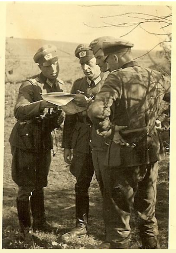 Looking for the right path. Photos of German soldiers with maps.... with humor