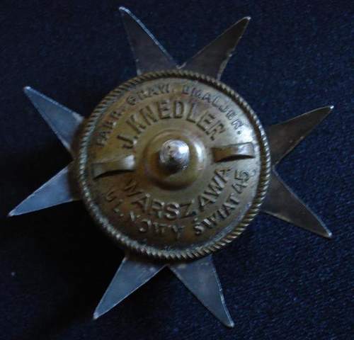 Odd WWI Polish Lancer Badge with design papers