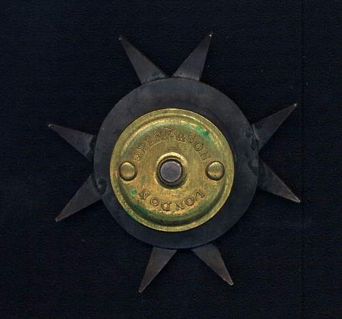 Odd WWI Polish Lancer Badge with design papers