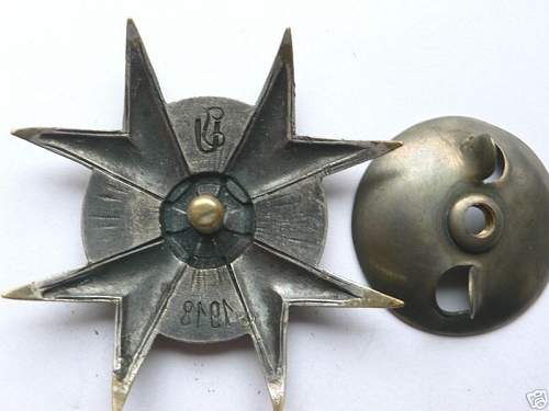 Odd WWI Polish Lancer Badge with design papers