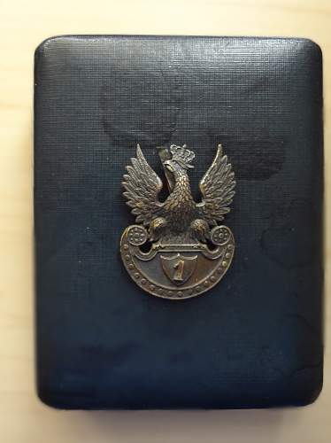 Virtuti Militari and  eagle of 1st Cavalry Regiment of Legions.